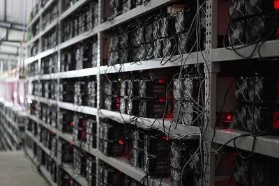 Large scale Bitcoin mining farm showcasing rows of efficient mining rigs