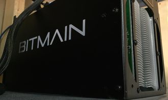 An intricate view of a mining rig setup in a professional hosting environment, highlighting efficiency and reliability